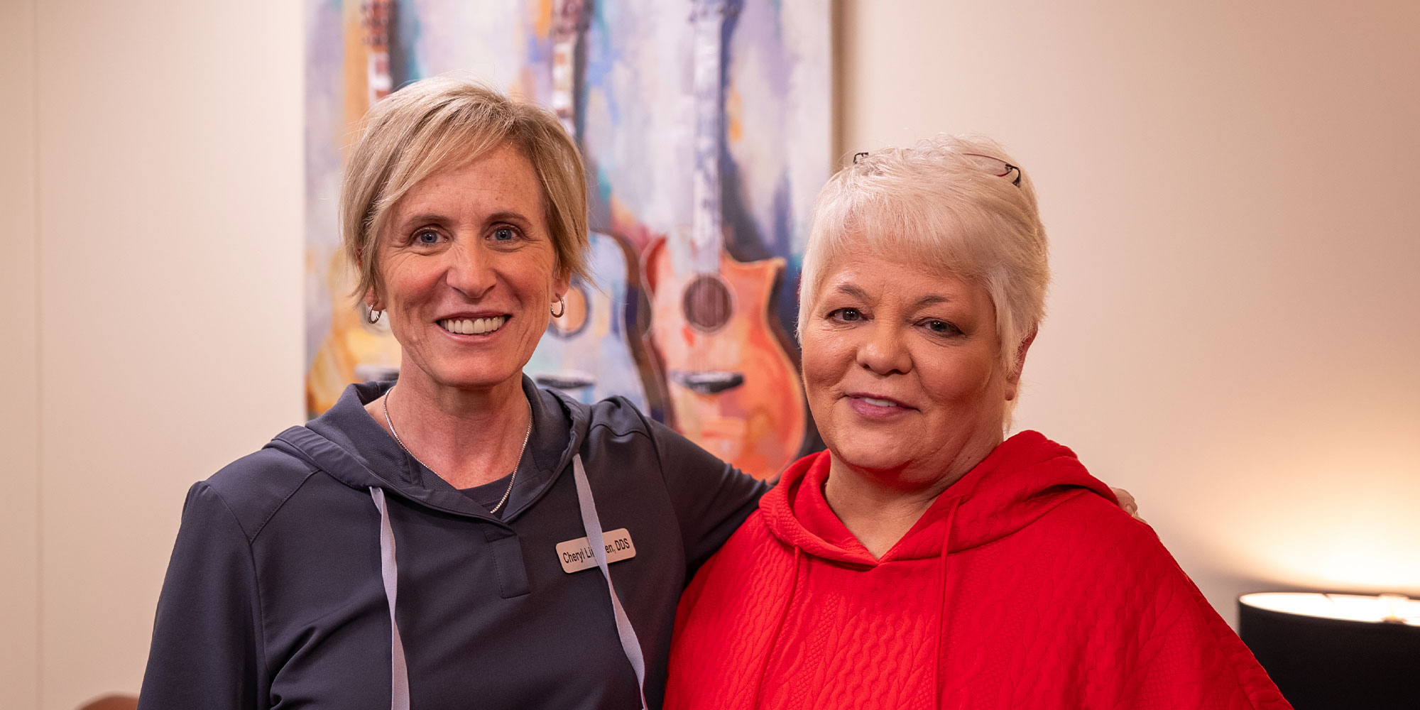 dr with lady in red after surgery talking bigger purpose