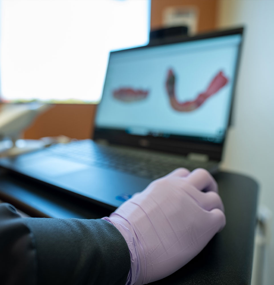 dental scans on screen for dental patient