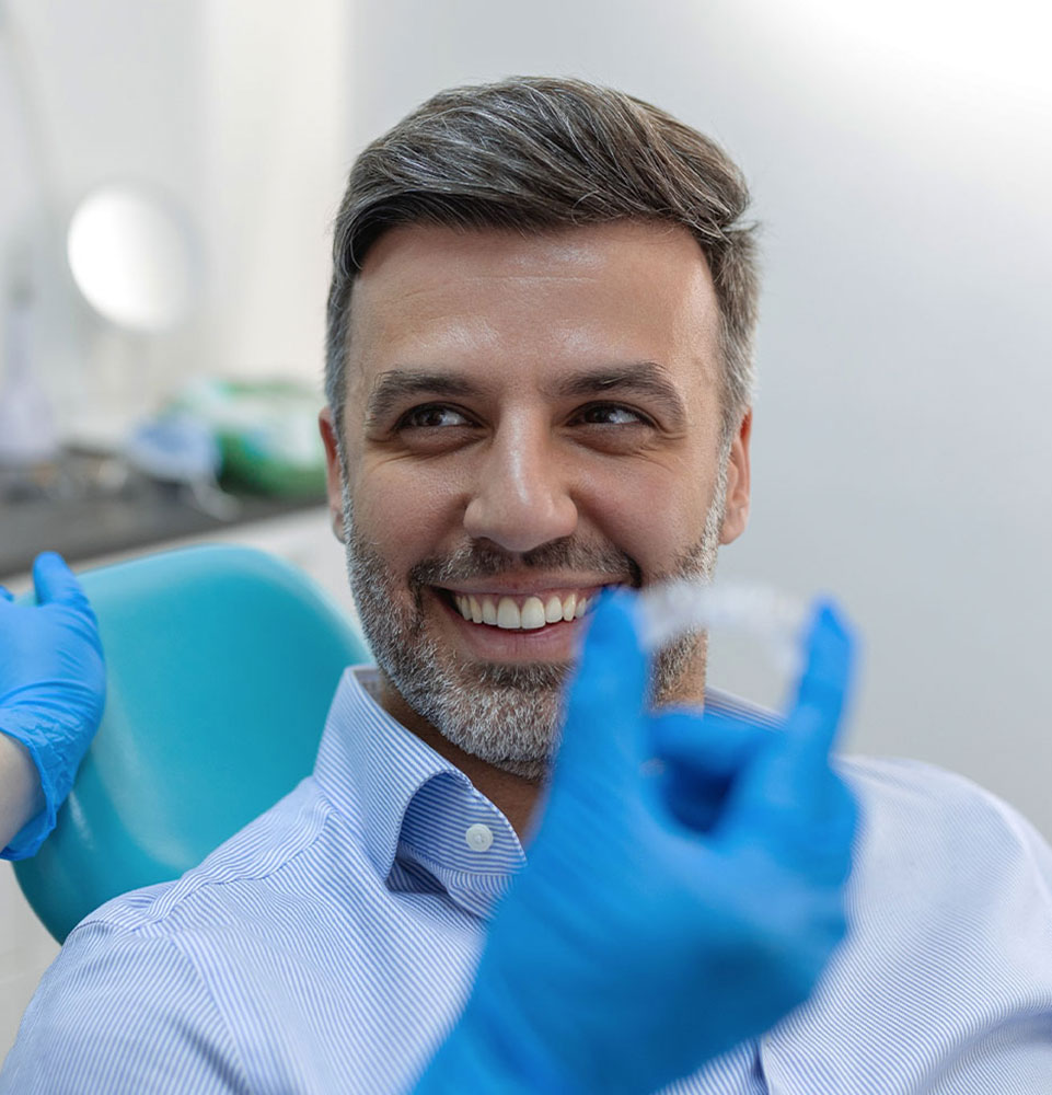 invisalign patient man collared shirt mobile