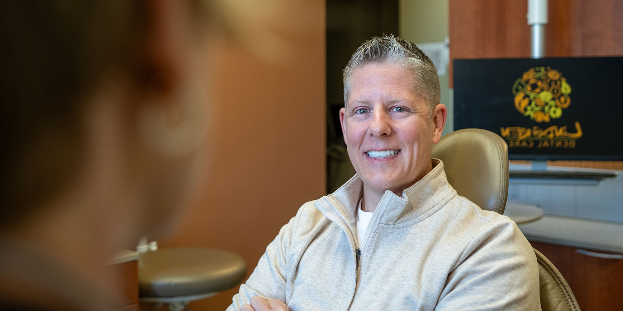 josh with his new smile in office