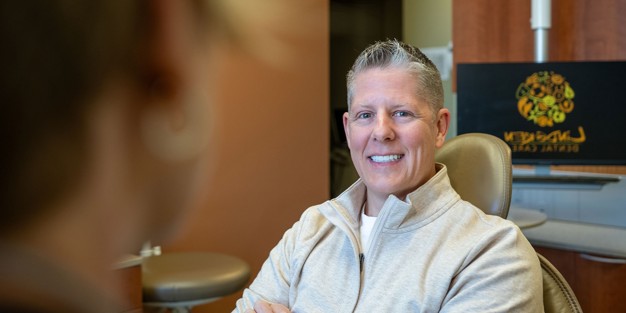 josh with his new smile in office