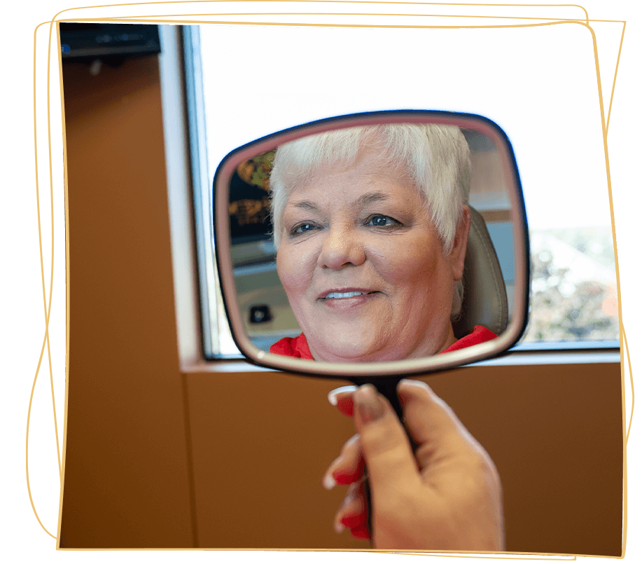 lady in red with her new smile