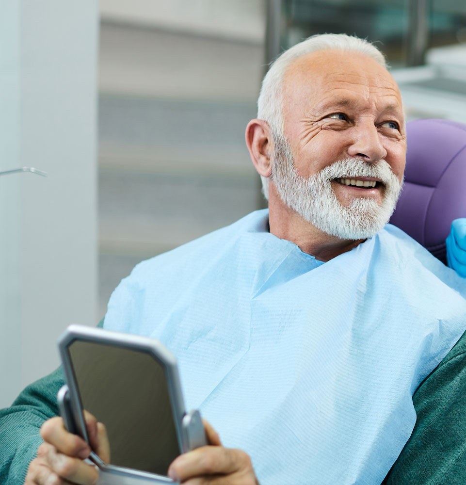 olderman with mirror new smile