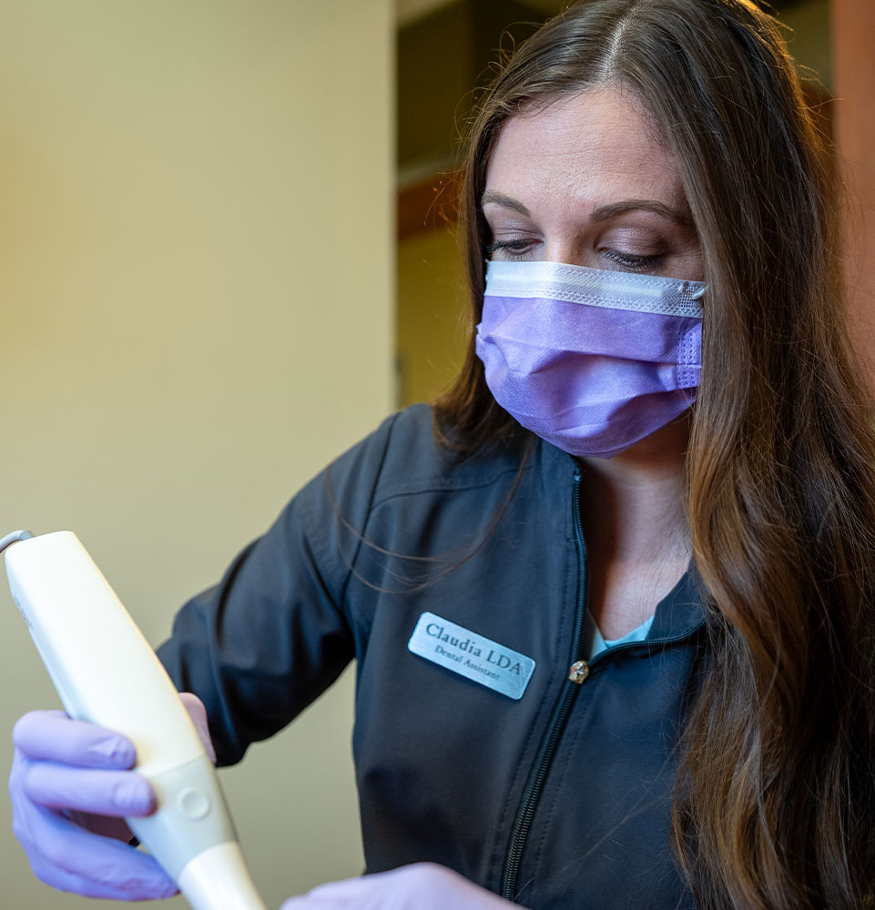 dental crown scan being taken by team member